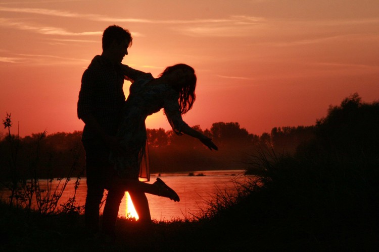 cute love couple at sunset image