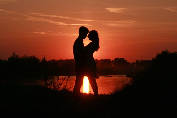 picture of loving couple at sunset