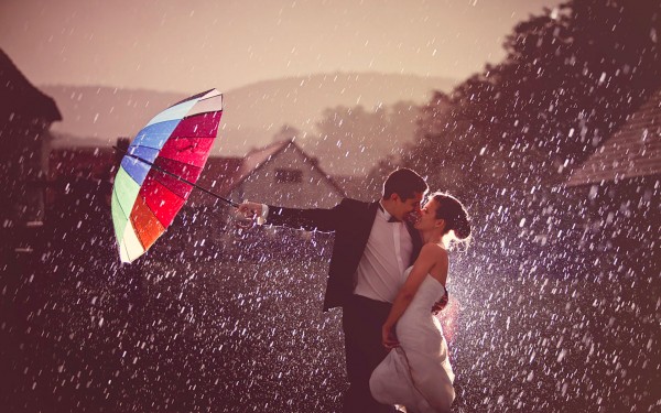 First kiss in rain after getting married
